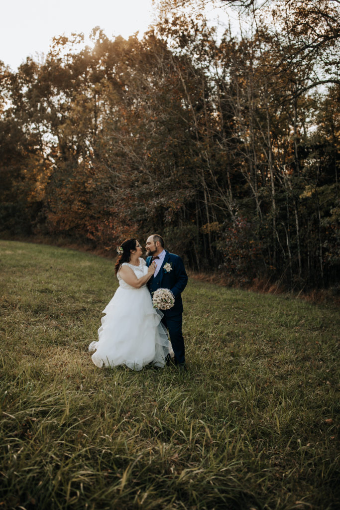 Wedding photo of a couple looking at each other taken by Dahlia Orchid Photography a Nashville based elopement and destination wedding photographer
