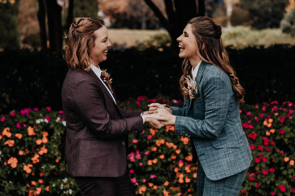 Nashville elopement photographer captures couple during elopement ceremony holding hands and celebrating recent marriage