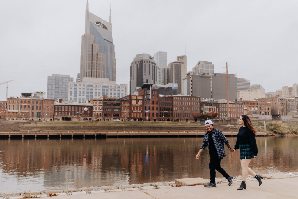A couple holding hands. Fall downtown nashville session