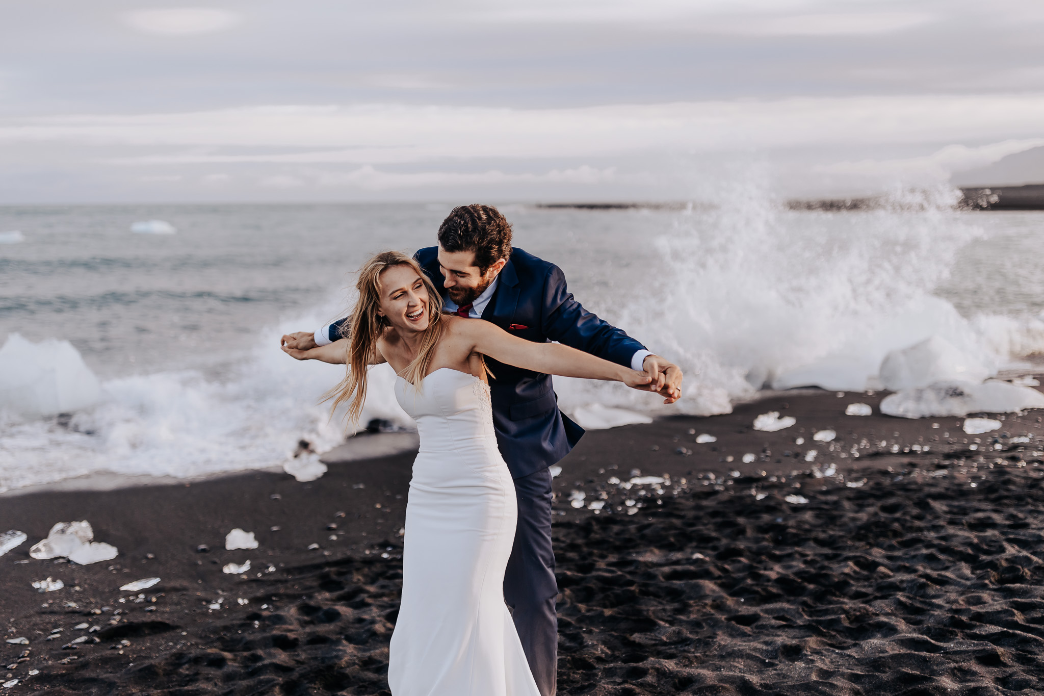 Destination Wedding Photographer captures bride and groom hugging during Iceland bridals