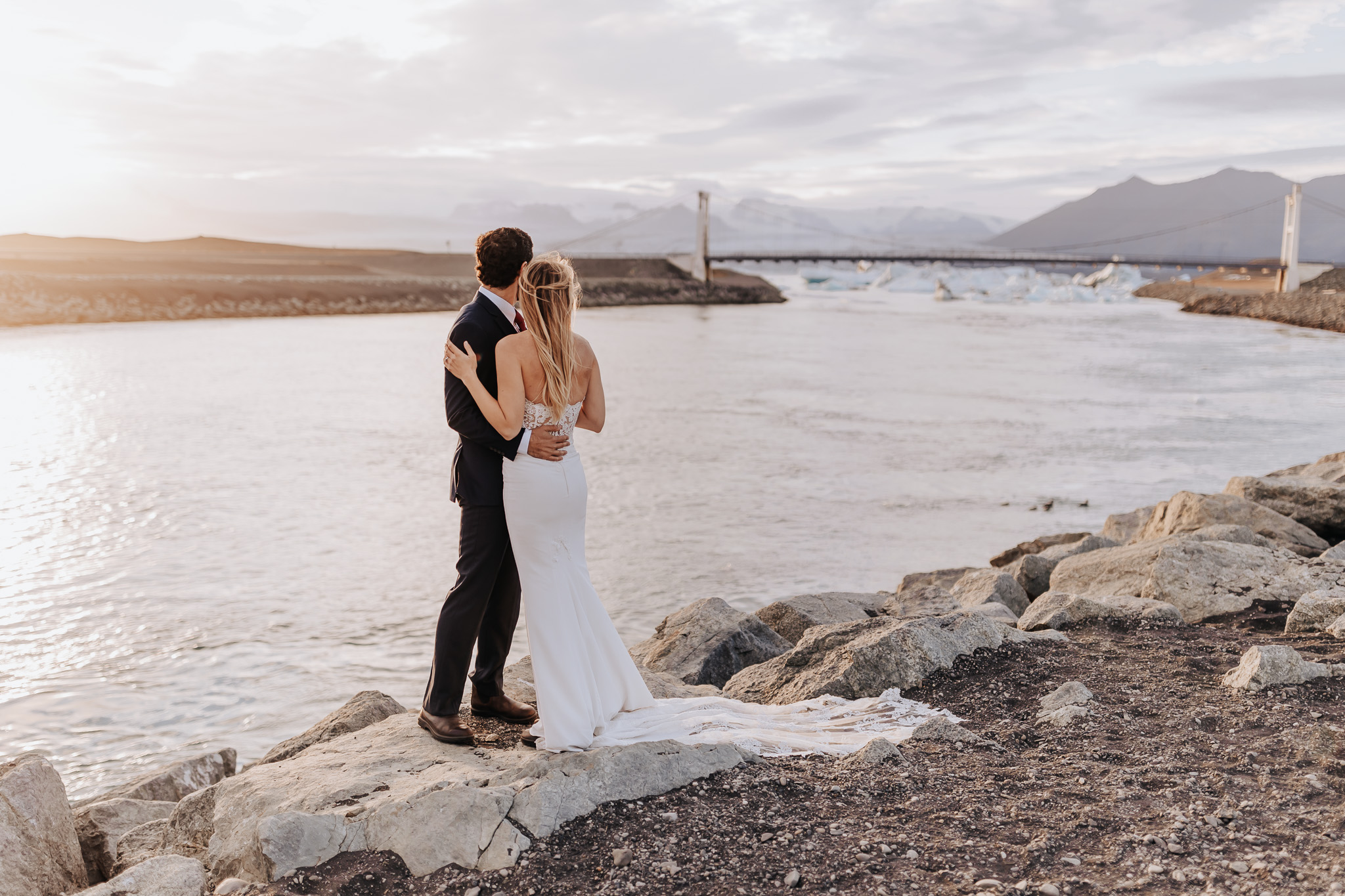 Iceland elopement photographer captures couple embracing after traveling to Iceland for their destination elopement