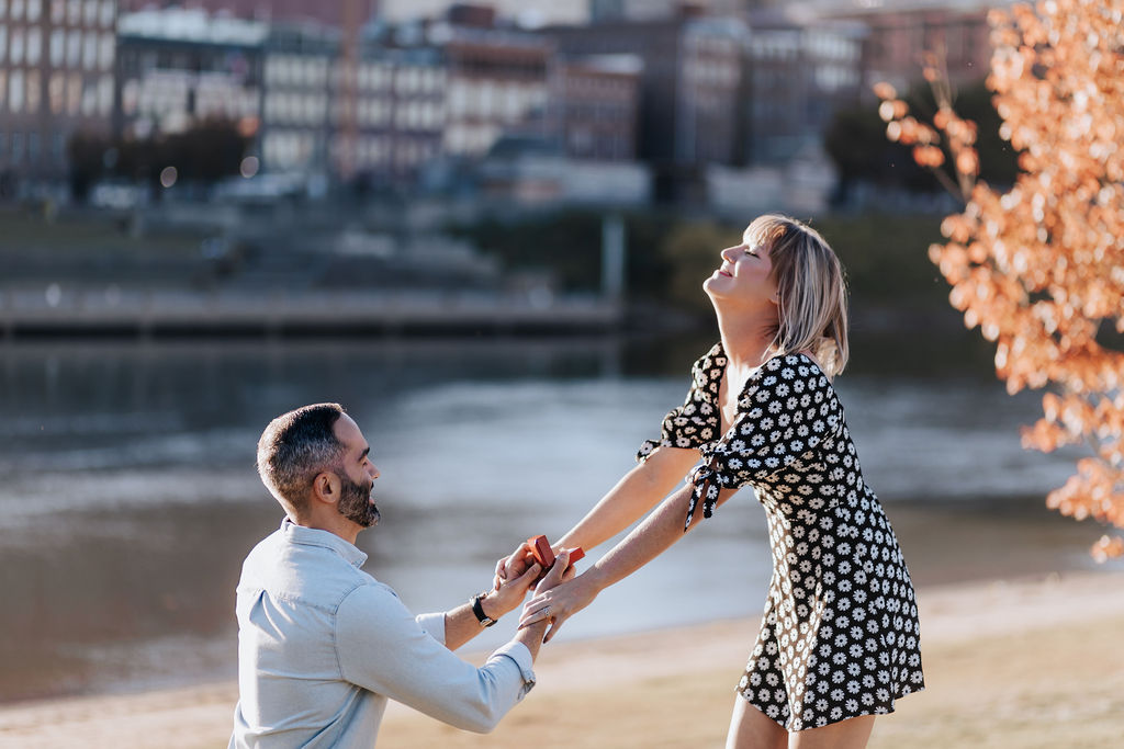 Nashville elopement photographer captures surprise proposal at top places to propose in Nashville - Cumberland River Park