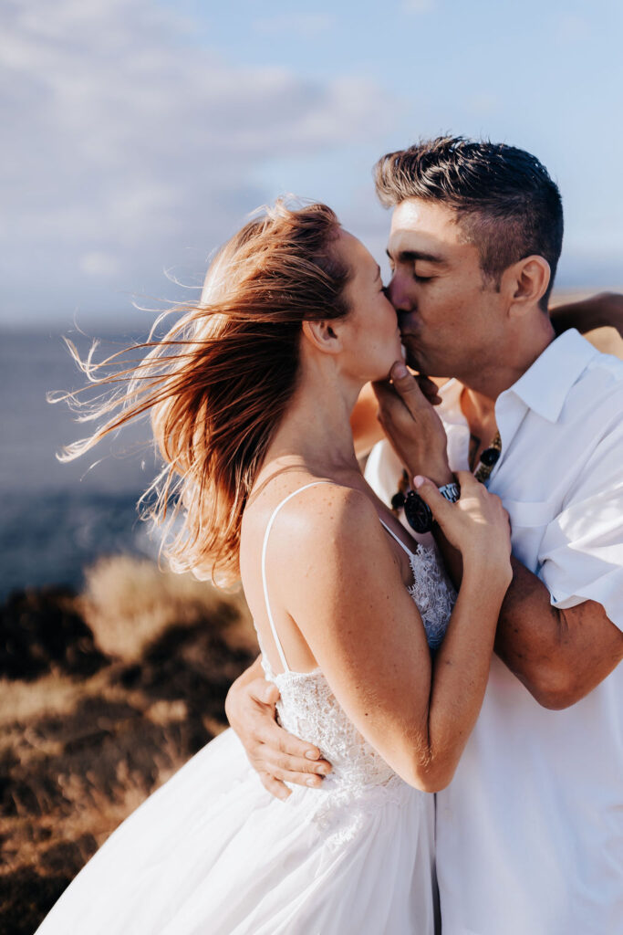 Big Island elopement photographer captures couple embracing after intimate elopement