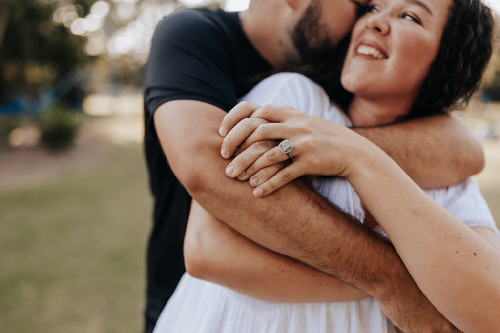 Nashville elopement photographer captures couple hugging before Nashville honeymoon activities