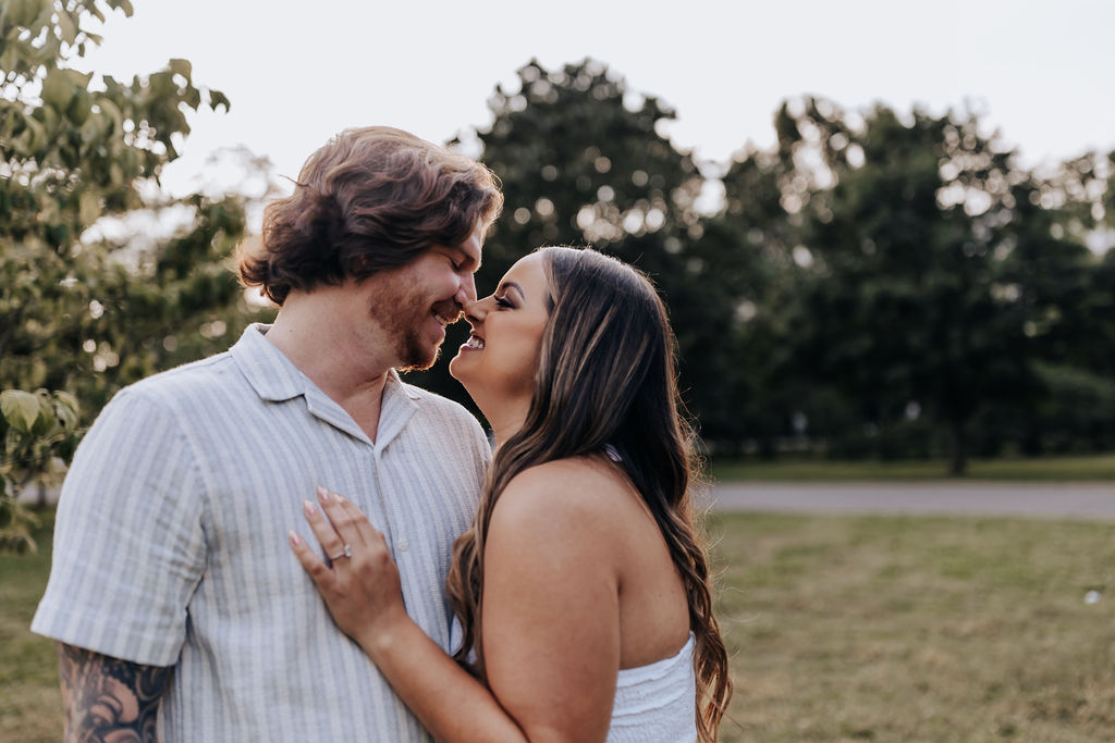 Nashville elopement photographer captures couple embracing during summer engagement photos