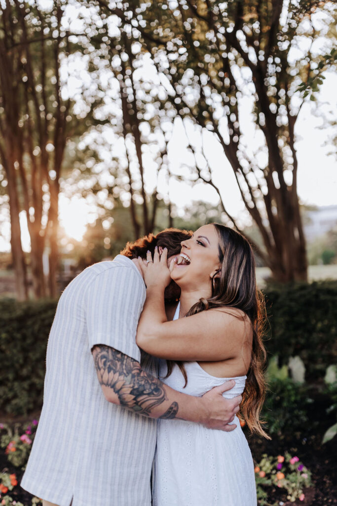 Nashville elopement photographer captures man hugging while woman laughs