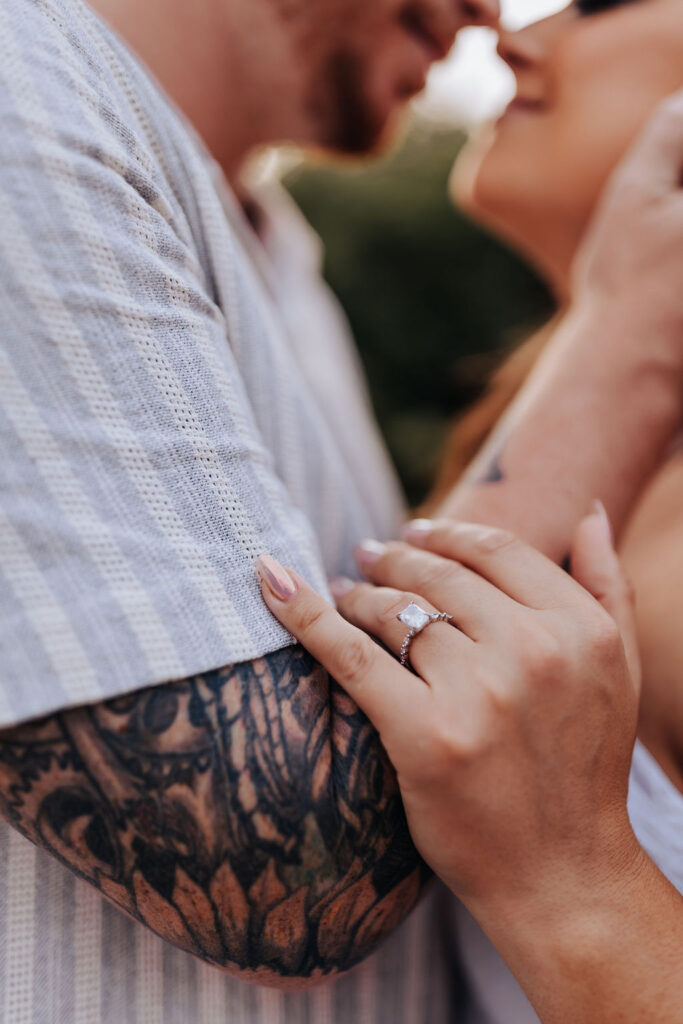 Nashville elopement photographer captures close up of man and woman embracing during engagement photos