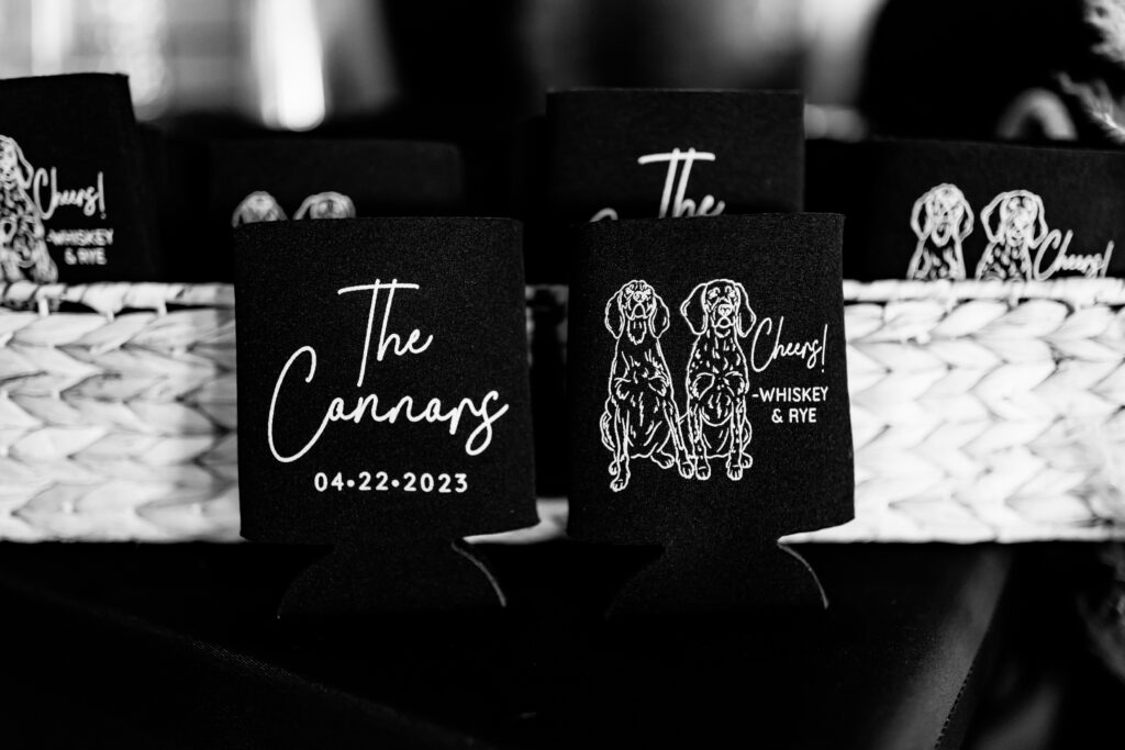 Nashville elopement photographer captures black and white portrait of coozies with pets on them for Nashville wedding