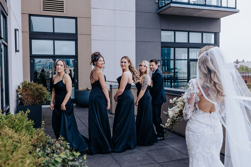 Nashville elopement photographer captures bridesmaids turning around during first look
