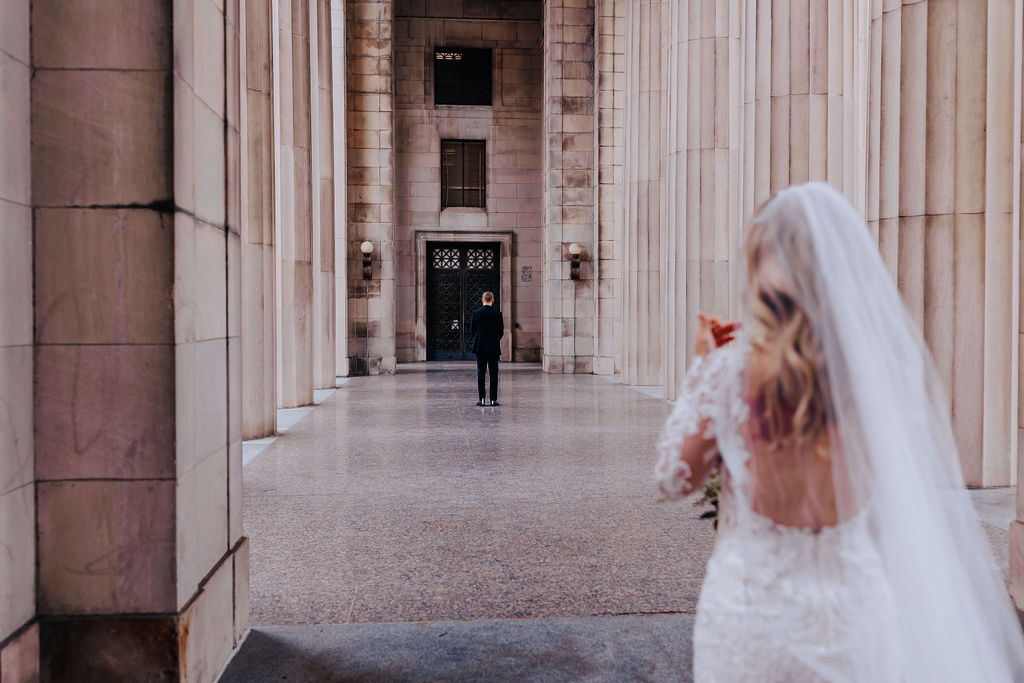 Nashville elopement photographer captures bride walking to groom for first look