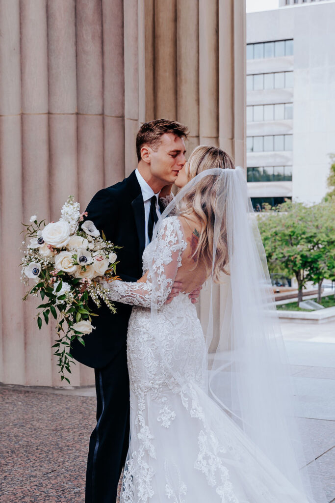Nashville elopement photographer captures couple kissing after first look