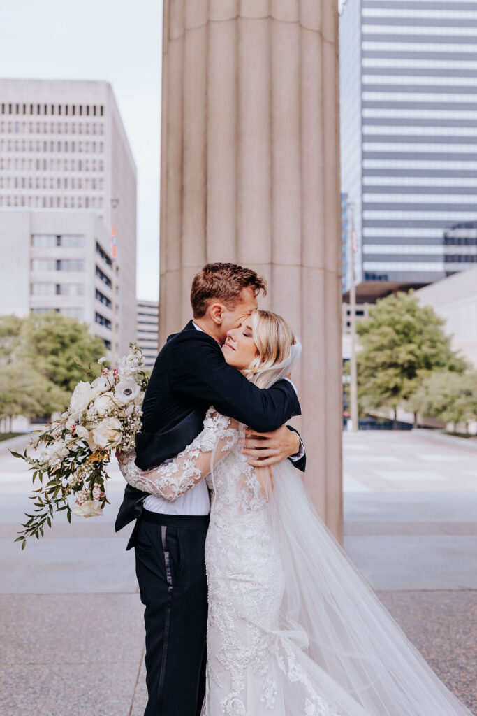nashville elopement photographer captures bride and groom hugging after first look