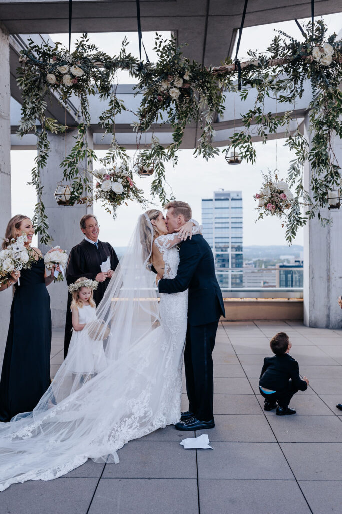 Nashville elopement photographer captures couple kissing after wedding ceremony