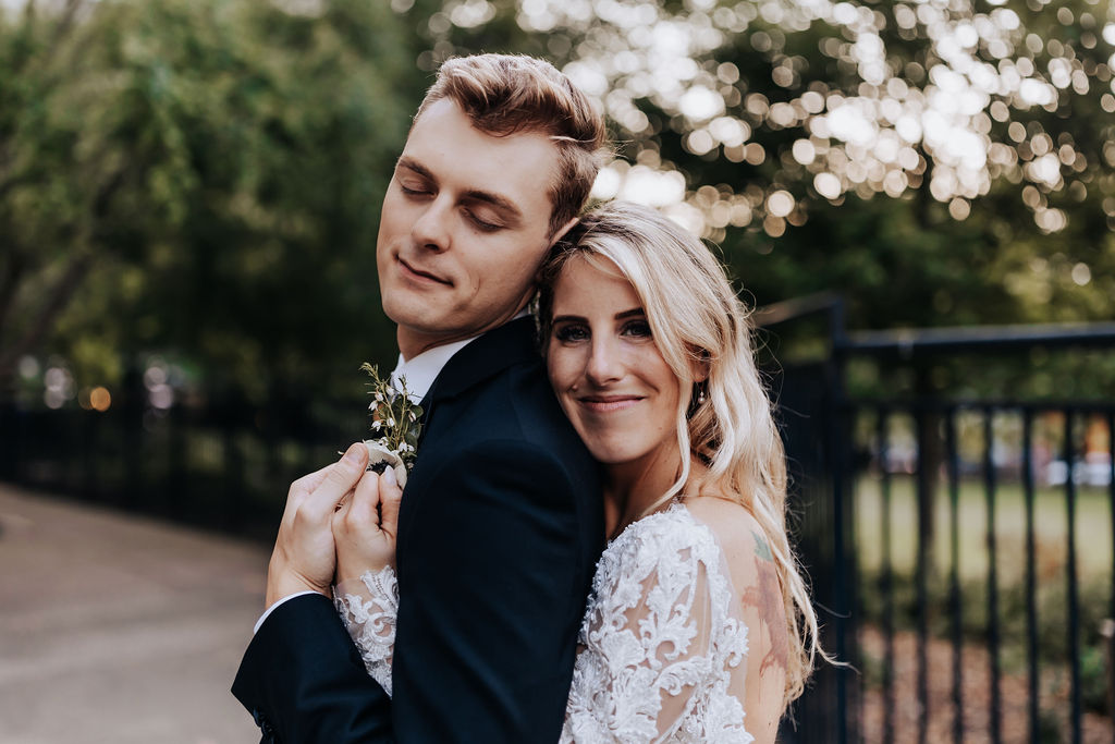 Nashville elopement photographer captures couple hugging during outdoor bridals