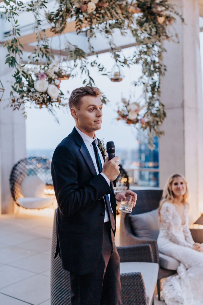 Nashville elopement photographer captures groom giving speech during reception