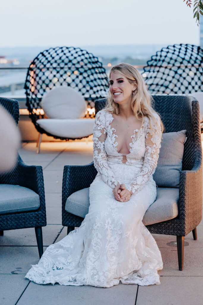 Nashville elopement photographer captures bride sitting in chair during wedding reception