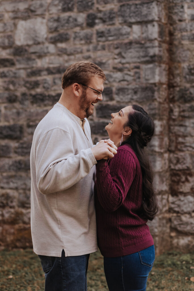 Nashville elopement photographer captures couple laughing together during fall engagement photos