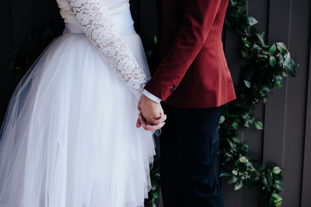 Nashville elopement photographer. captures couple during first look before intimate Nashville indoor wedding