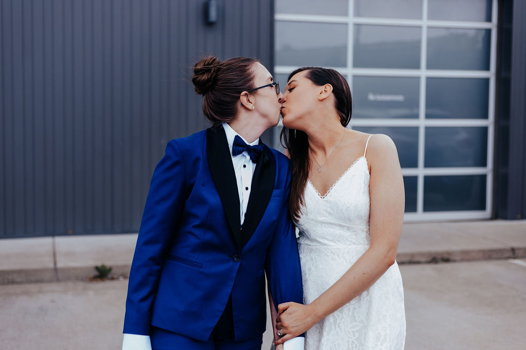 Nashville elopement photographer captures couple kissing outdoors after wedding ceremony