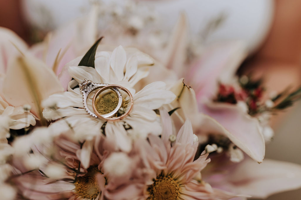 Nashville elopement photographer captures close up of bridal bouquet and rings
