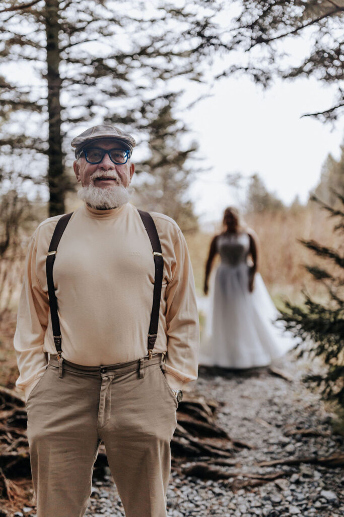 Nashville elopement photographer captures bride walking up to father during first look