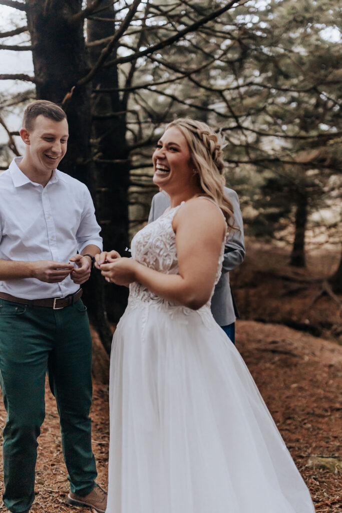 Nashville elopement photographer captures bride laughing during wedding ceremony