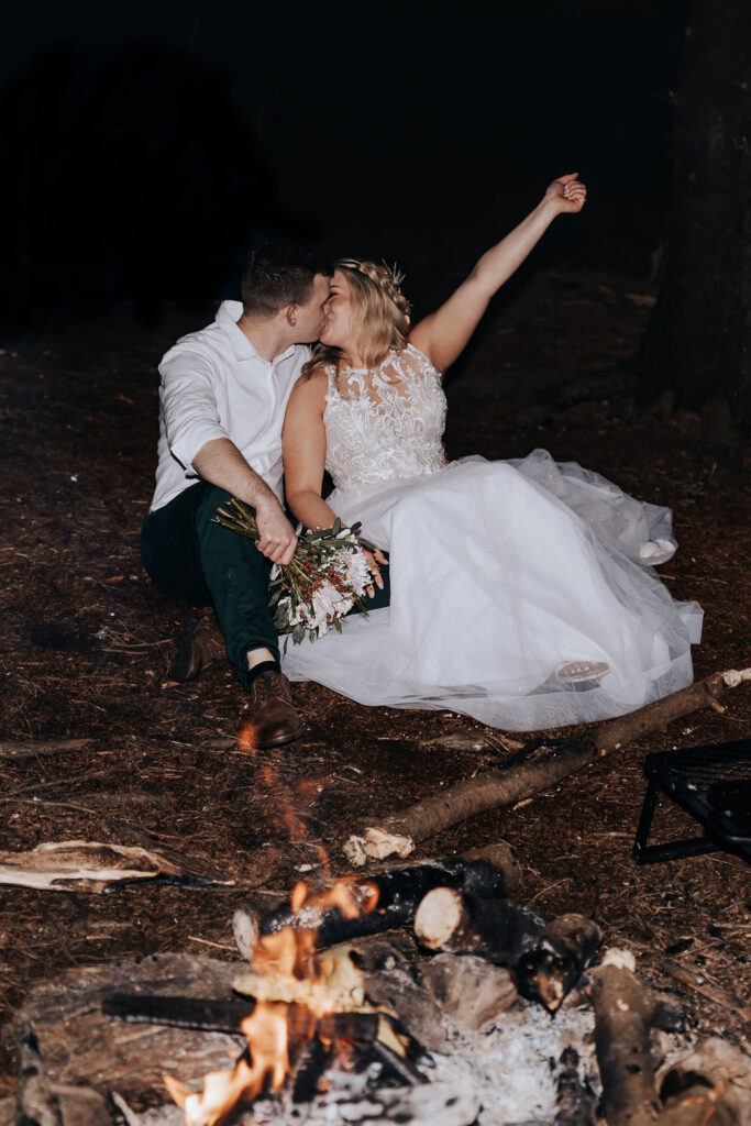 Nashville elopement photographer captures couple celebrating with bonfire after ceremony