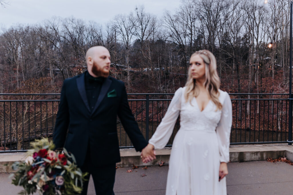 Nashville elopement photographer captures bride and groom holding hands during bridal portraits