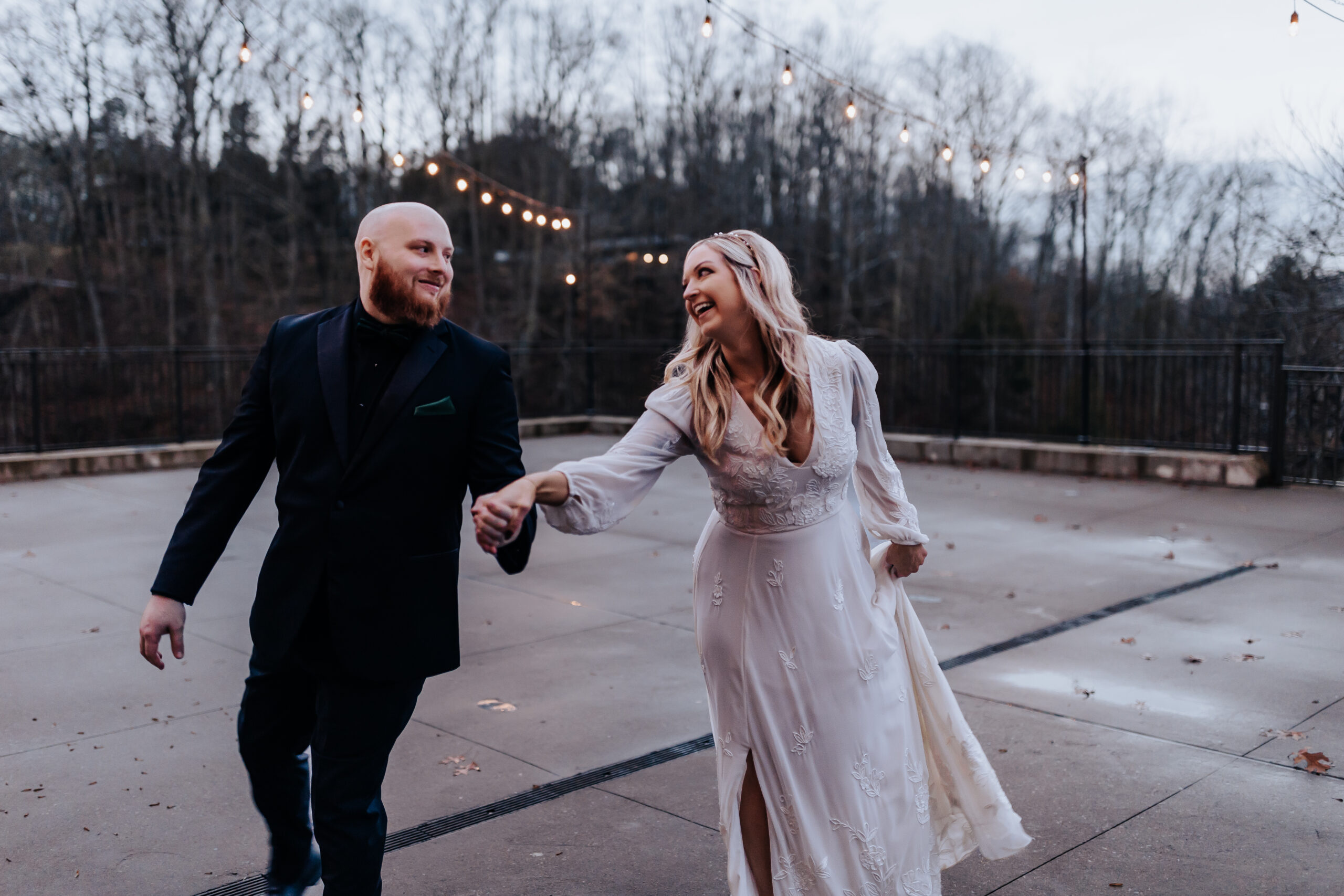 Nashville elopement photographer captures bride and groom walking together and holding hands