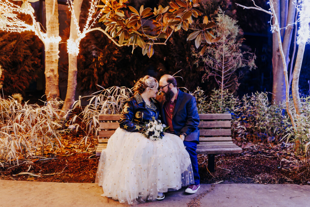 Nashville elopement photographer captures couple sitting on bench after winter wedding