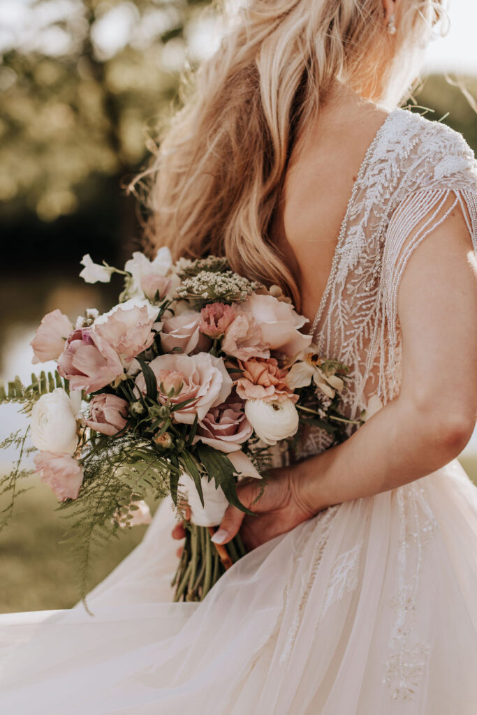Nashville elopement photographer captures bride holding bouquet behind back