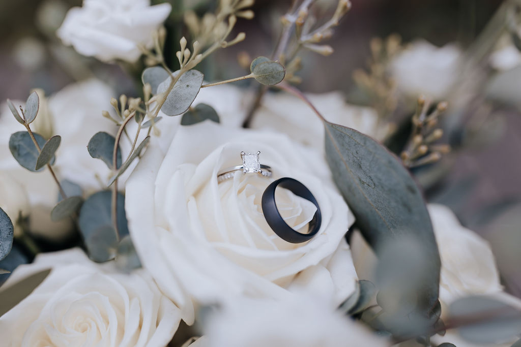 Nashville elopement photographer captures wedding rings in bouquet during Jerome Event Center wedding