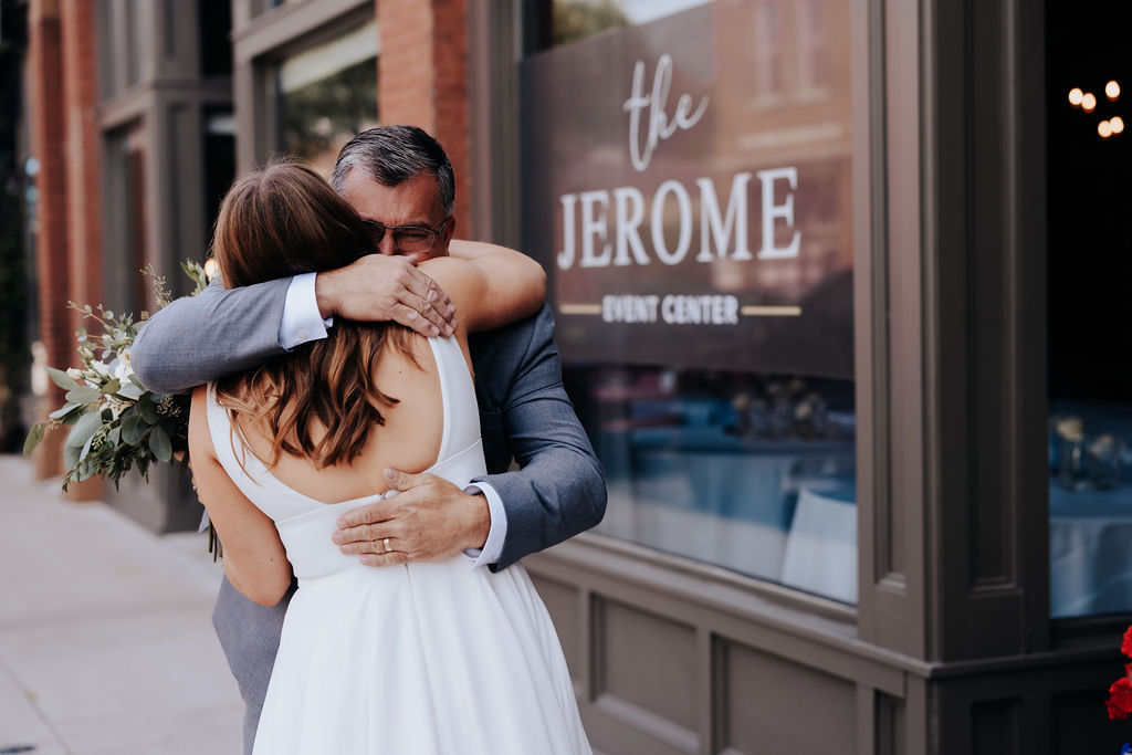 Nashville elopement photographer captures father hugging daughter before her wedding day