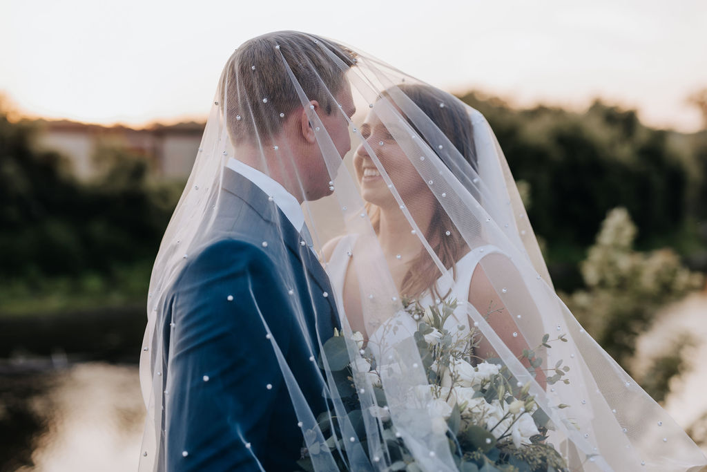 Nashville elopement photographer captures bride and groom under veil