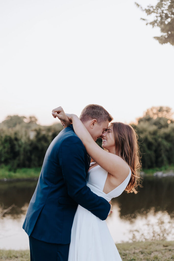 Nashville elopement photographer captures bride and groom kissing during golden hour portraits
