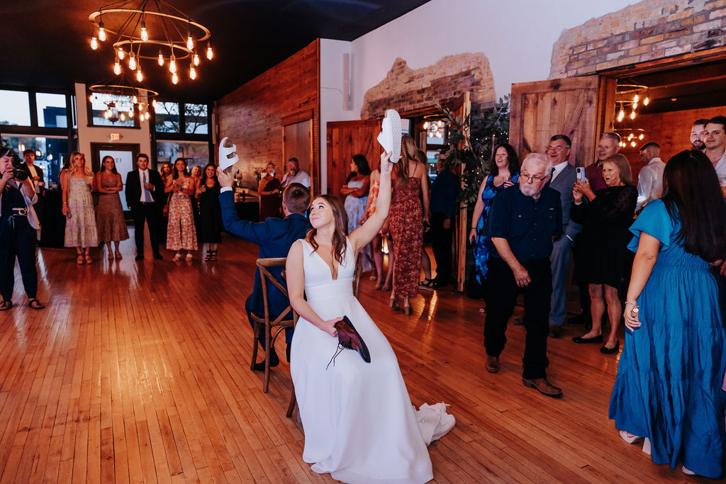 Nashville elopement photographer captures couple playing games at reception