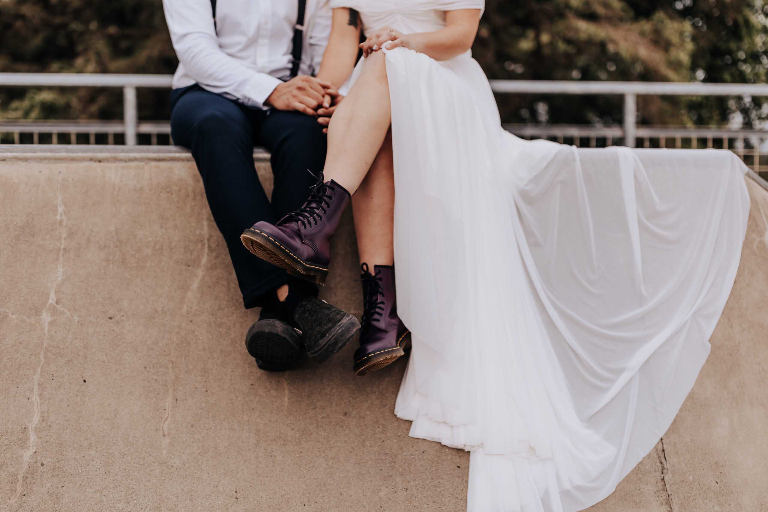 Nashville elopement photographer captures bride and groom taking portraits at skate park