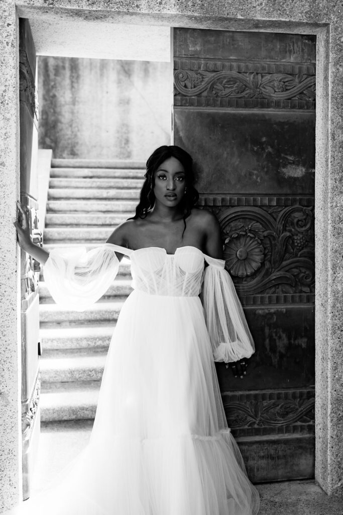 Destination elopement photographer captures bride wearing sleeveless gown 