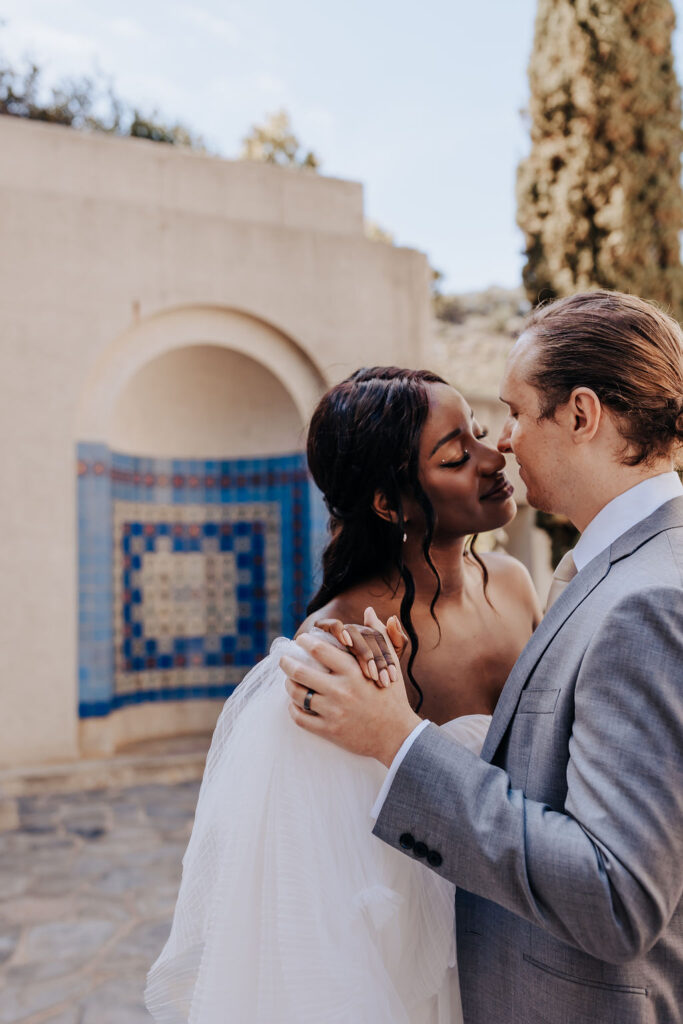 Destination elopement photographer captures couple kissing during first dance