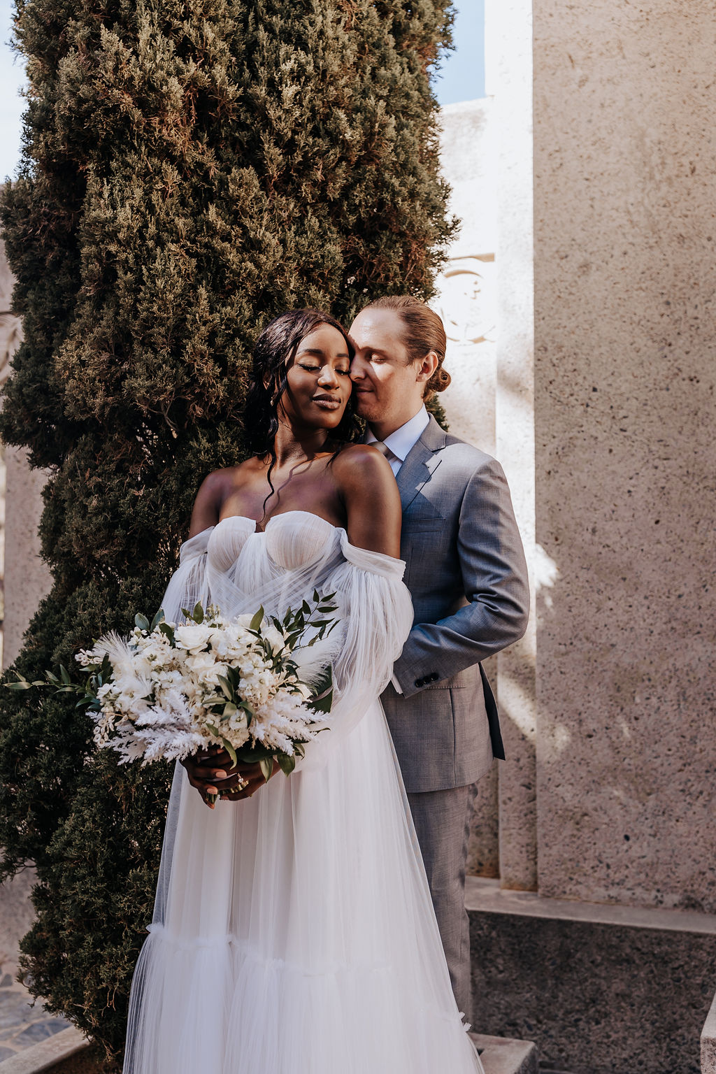 Destination Wedding Photographer captures couple embracing during destination wedding