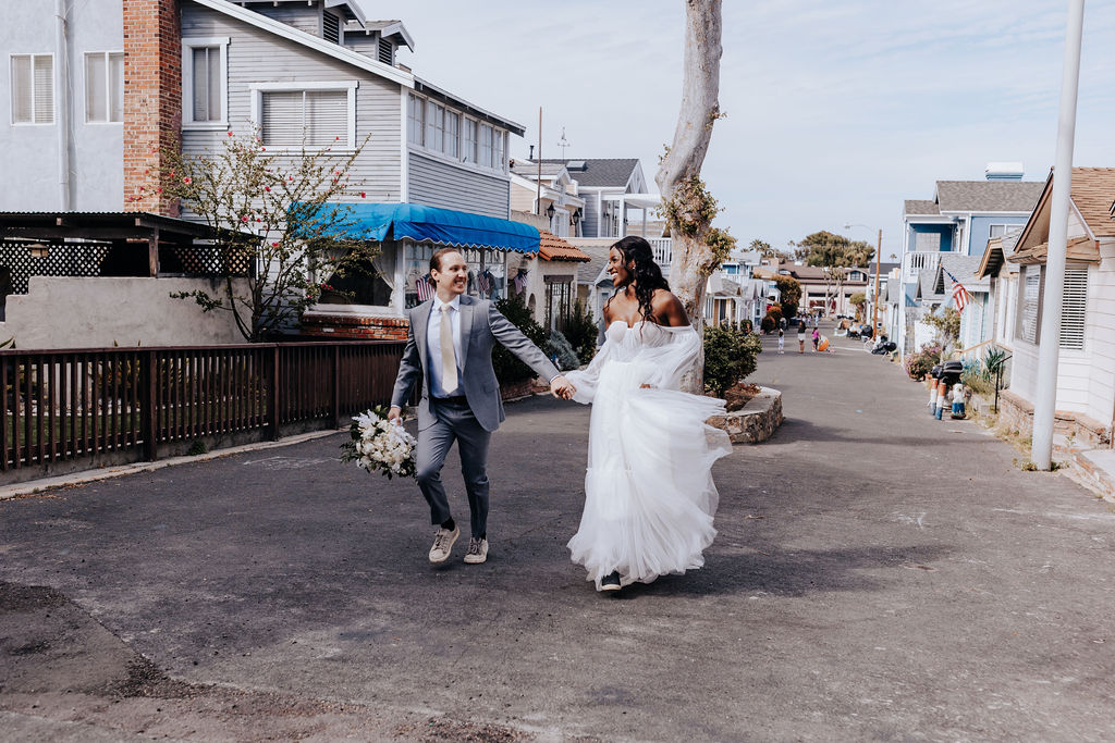 Destination elopement photographer captures bride and groom walking together after elopement ceremony