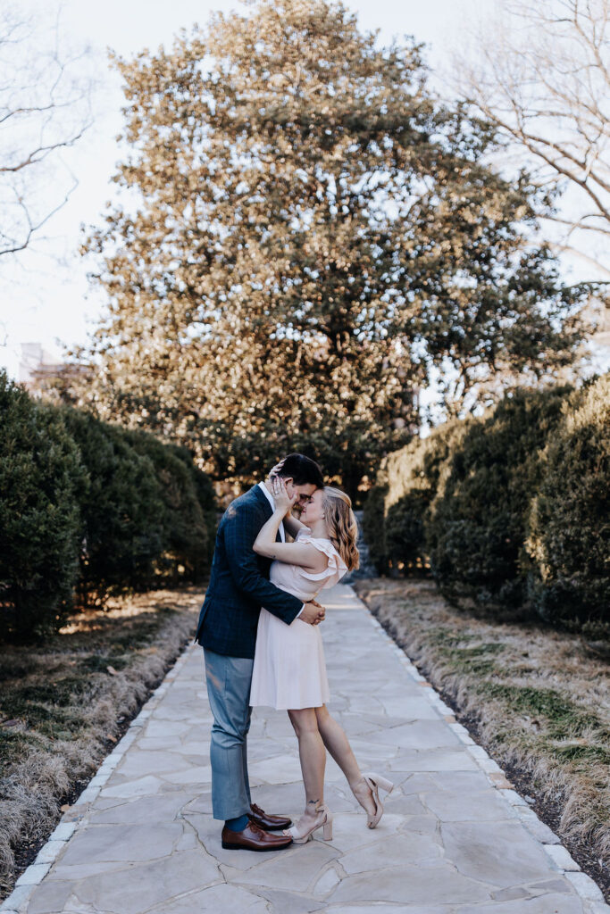 Nashville elopement photographer captures couple kissing during charming Tennessee winery engagement photos
