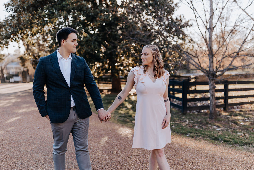 Nashville elopement photographer captures couple holding hands and walking together 