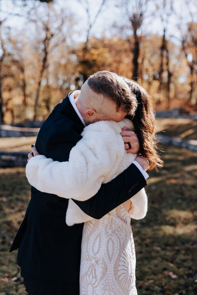 Nashville elopement photographer captures man hugging woman during first look
