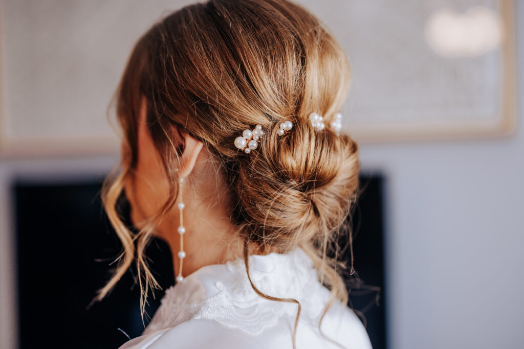Nashville elopement photographer captures bride wearing hair up with pearl accents