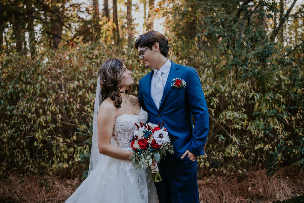 Destination Wedding Photographer captures bride and groom looking at one another during bridal portraits