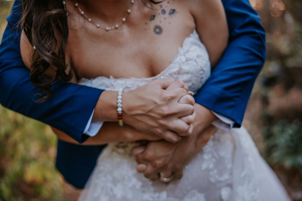 Destination wedding photographer captures bride and groom embracing