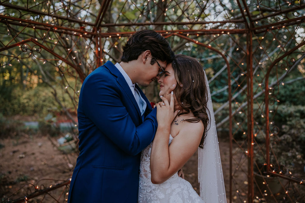Destination wedding photographer captures bride and groom kissing after first look