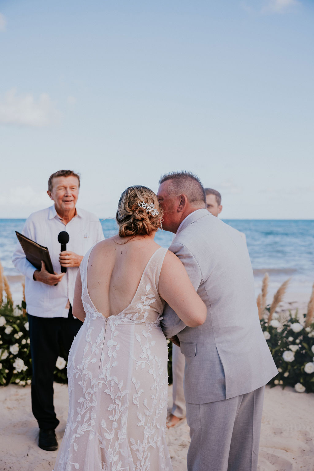 Destination wedding photographer captures bride's father walking her down the aisle