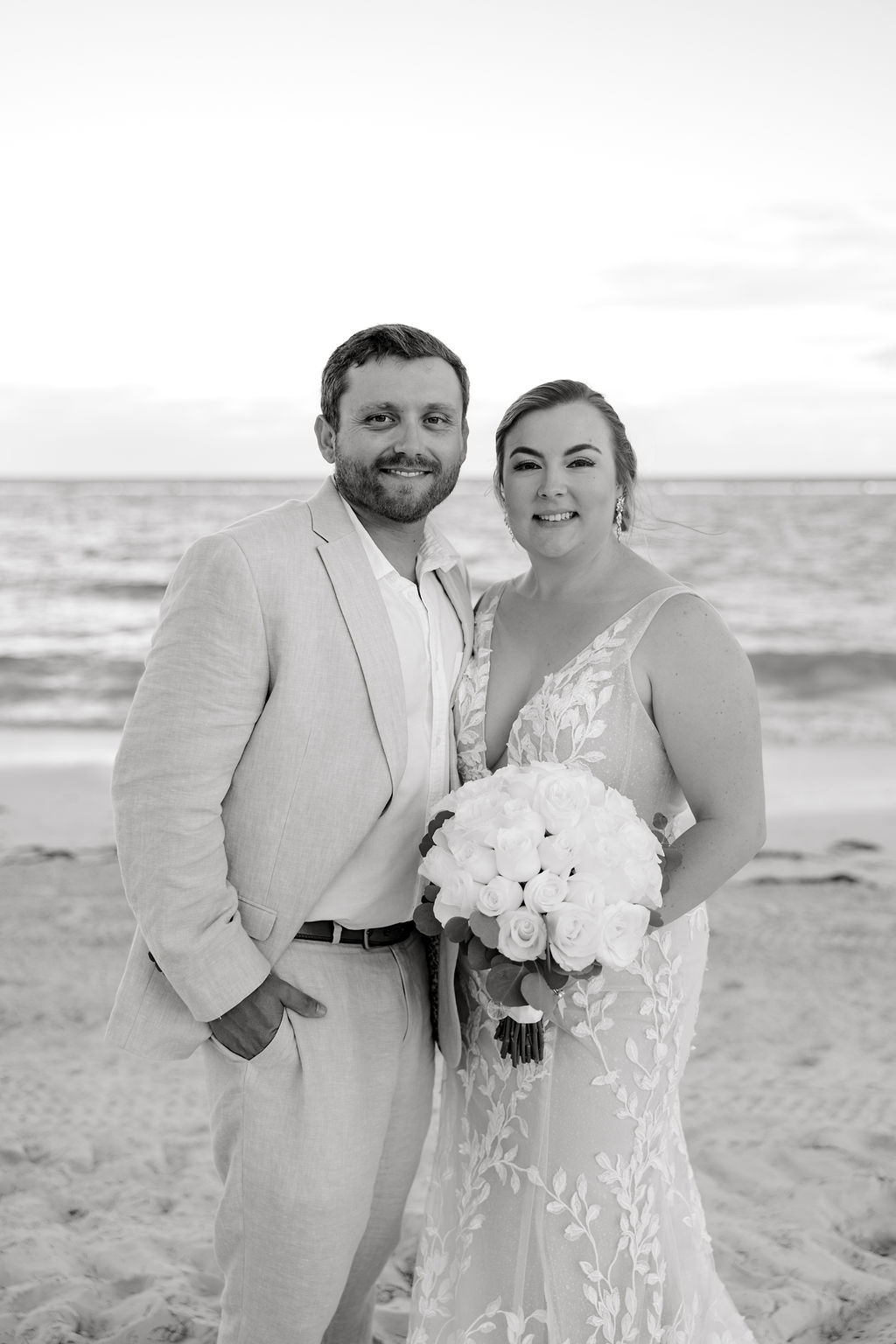 Destination wedding photographer captures bride and groom embracing